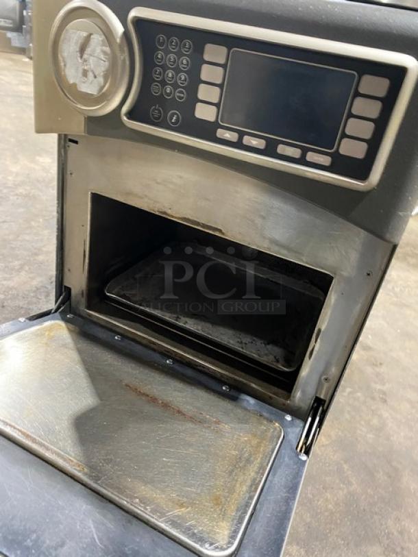 2018 Turbo Chef NGO rapid cook oven, 208/230V, 1 phase, countertop model on legs. Visible wear inside. Serial NGOD41059.