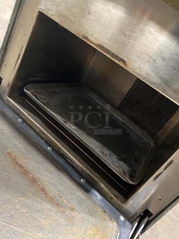 2018 Turbo Chef NGO rapid cook oven interior, showing wear. Electric, 208/230V, 1 Phase. Model NGOD41059. On legs.