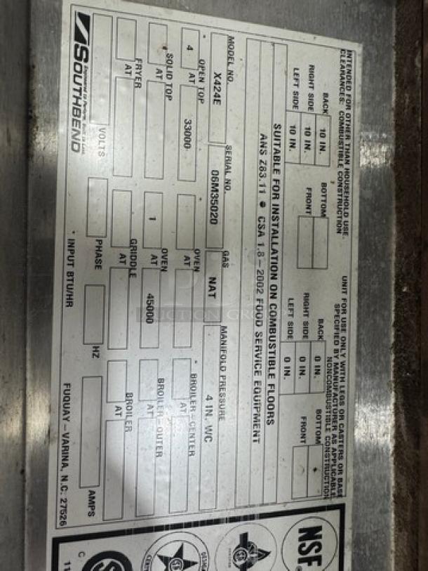 SOUTHBEND X424E Commercial NG 4 burner range label, details gas type, amps, voltage, and safety standards, NSF certified.