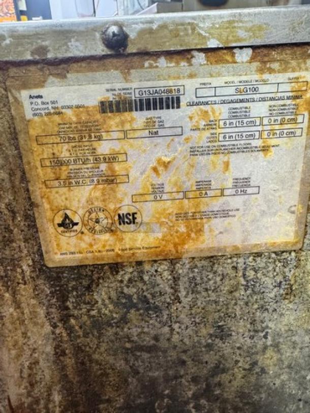 ANETS SLG100 Commercial NG Fryer, showing rusted exterior, model and specs label visible, 70 lbs capacity, NSF certified.