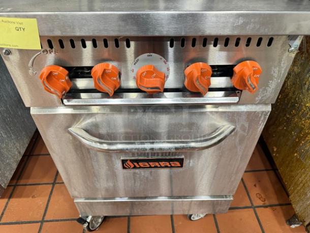 SIERRA SR424 commercial gas range with 4 burners, orange knobs, stainless steel finish, and on casters; used condition.