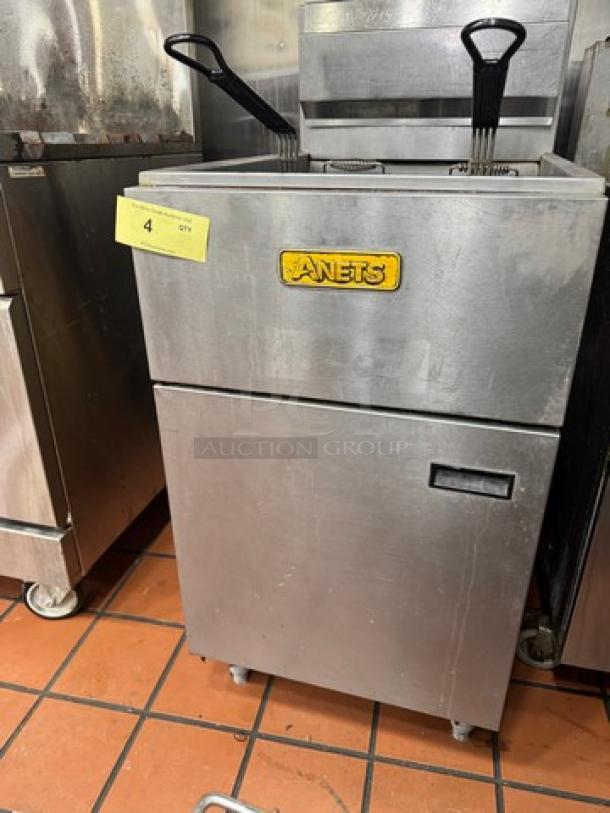 ANETS SLG100 Commercial NG Fryer with baskets, stainless steel, used condition, visible ANETS logo, on tiled floor.