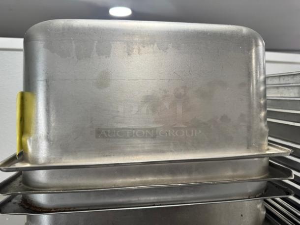 1/3 full size stainless steel food pan, model BIDX3, used condition, visible wear marks, stackable design.