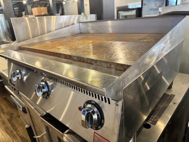 STAR Ultramax Electric 36" countertop griddle, stainless steel, showing signs of use, visible knobs and control panel.