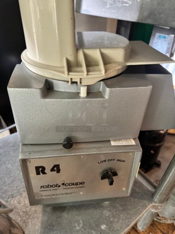 robot-coupe R4 Commercial Food Processor, 220V, silver finish, visible controls for low, off, high settings.
