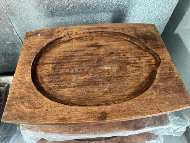 14" rubberwood display stand for hot skillets, features durable wood construction, new condition, BIDx3 brand.