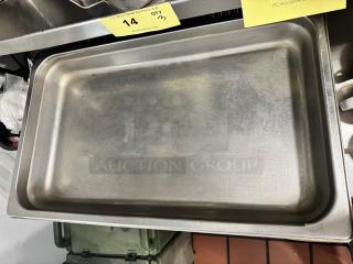 Full-size 2 1/2" deep stainless steel food pan, used condition, visible surface scratches, ideal for kitchen use.
