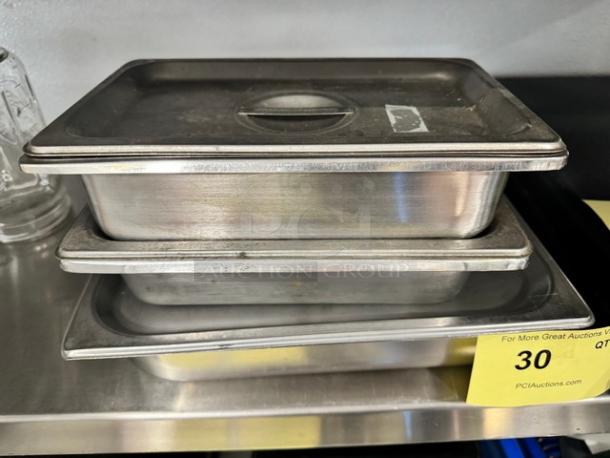 Stainless steel pan with lid, model BIDX3, stackable, pre-owned condition, minor surface wear, no visible labels.
