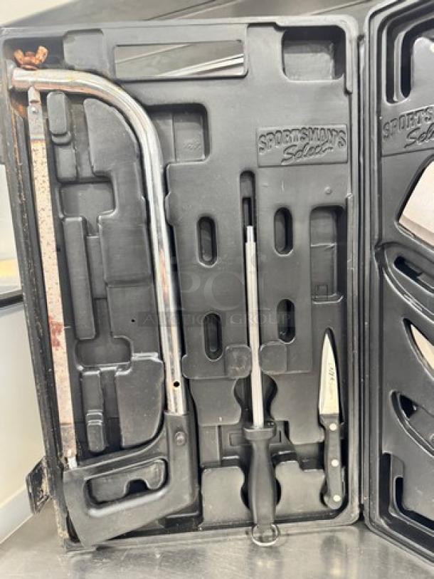 Sportsman's Select Knife Set in a black case, includes saw, sharpening tool, and knife; appears gently used.