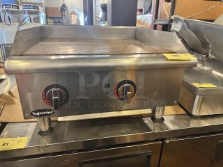 Superior GGM-24 24" natural gas griddle, stainless steel, dual control knobs, light wear, branded "Superior."