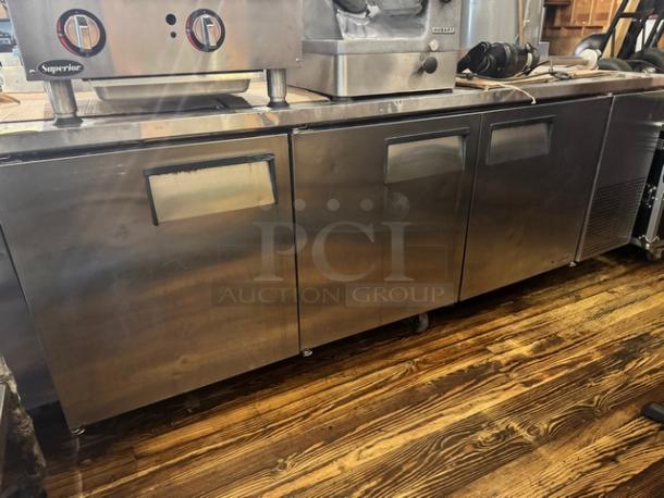 TRUE TWT-93 3-door worktop refrigerator on casters, stainless steel, excellent condition, commercial grade.