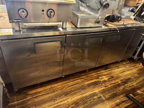 TRUE TWT-93 3 Door Worktop Refrigerator on casters, stainless steel, used condition, durable commercial design.