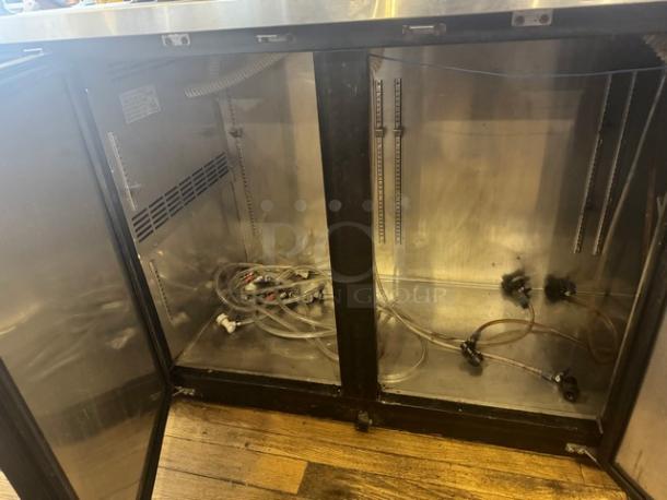 AVANTCO 178UDD72HC commercial beer dispenser, open interior view showing cooling coils and tubing, stainless steel finish.