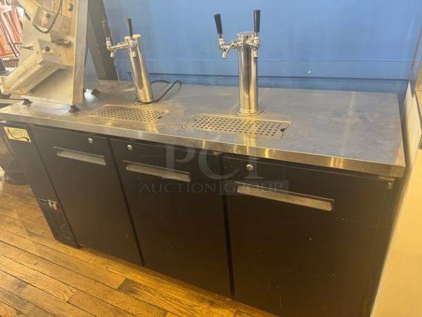 AVANTCO 178UDD72HC commercial beer dispenser, 115V. Features stainless steel top, dual taps, three-door storage, used condition.