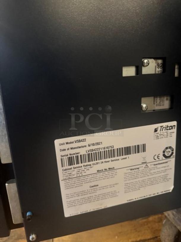 Triton VS8422 smart safe, model VS8422, manufactured 6/18/2021. Features visible label with serial number LVS842211617573.