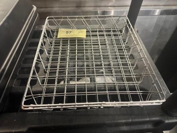 Wire rack, model BIDX2, shown on a black surface. Features grid design with a yellow label numbered 57 indicating auction details.