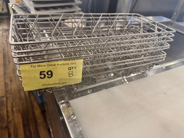 Stainless steel wire display basket, ideal for pastry display, in good condition. Lot tag indicates quantity of 8.