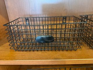 Set of 2 black wire hanging baskets, rectangular design, with mounting holes. Appears in excellent condition.