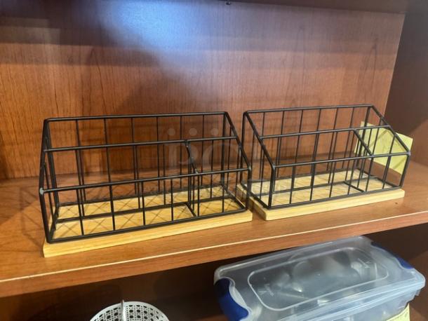 Lot of 2 desk organizers with black metal grid design and wooden bases, in excellent condition, ideal for office use.