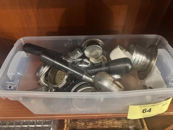 Espresso machine accessories, assorted parts in plastic bin, used condition. Includes handles, filters, and tampers. All one money.