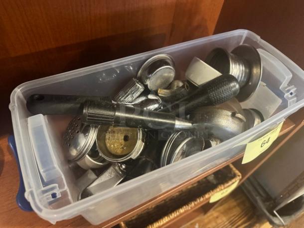 Box of espresso machine accessories, including portafilters and filters, assorted condition. Sold as a lot.