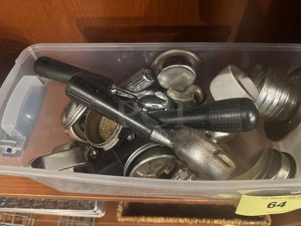 Box of assorted espresso machine accessories, including portafilters and baskets, in good condition. All items included.
