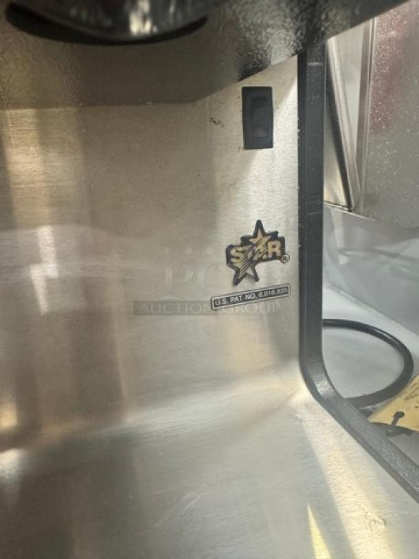 Star HPOE2 commercial chili-cheese dispenser in stainless steel, 120V, with visible brand logo and U.S. patent number.