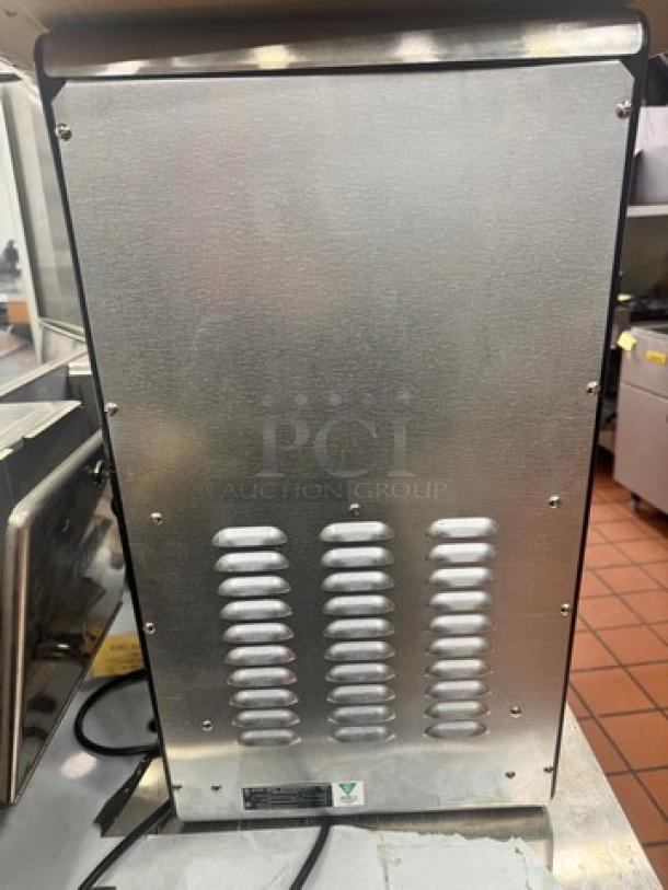 Star HPOE2 Chili-cheese dispenser, commercial-grade, 120V, stainless steel, visible vent detailing, used condition.