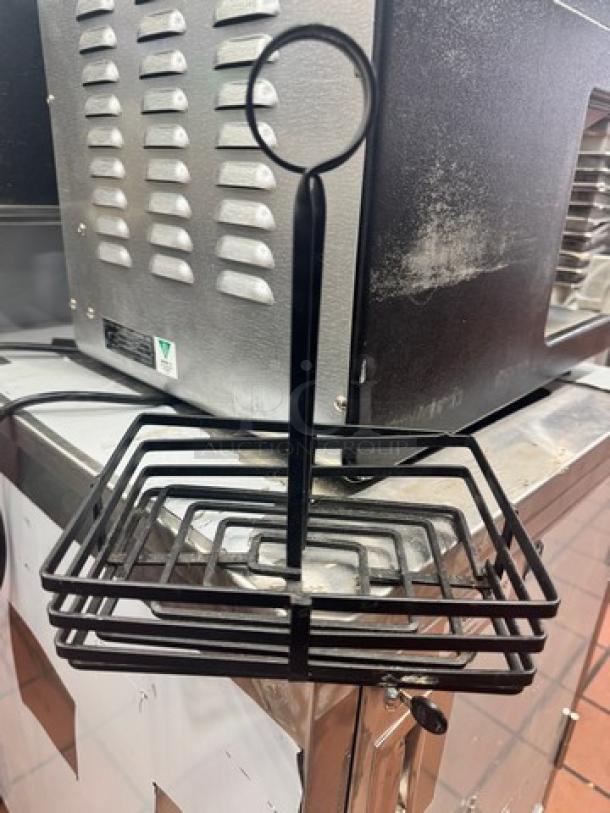 Black metal condiment caddy with card holder, model BIDX6. Features a square base and handle for easy transport.