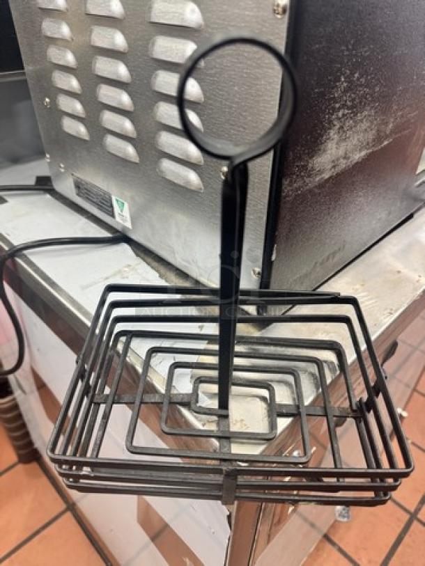 Black metal condiment caddy with card holder BIDX6, square design, gently used.