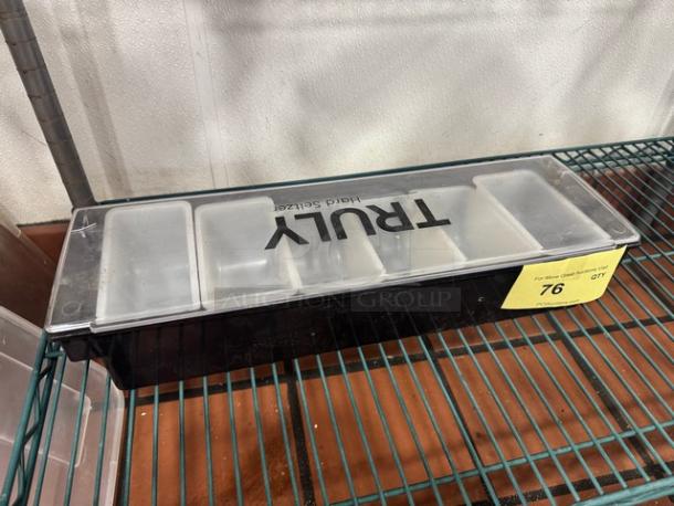 Truly condiment tray with lid, multiple compartments, clear and black, gently used, item number 76.