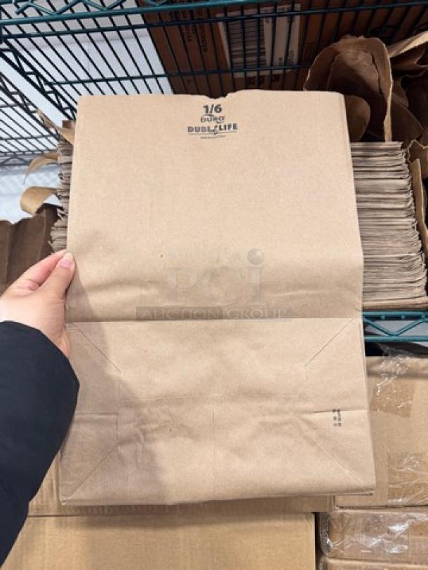 Lot of Duro 1/6 paper sack bags, showing "Dubl Life" label. Brown, unused condition. Ideal for packaging or crafts.