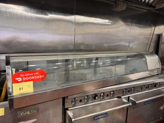 Turbo air SAK-70K Sakura Sushi Display Merchandiser, 120V, stainless steel, clear display, some wear, "We deliver with DOORDASH" sticker.