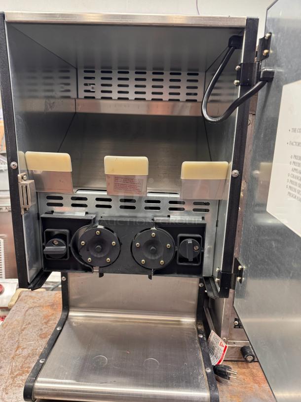 Gold Metal 5301 Dual Chili Cheese Dispenser, 120V, open view. Features dual nozzles, stainless steel finish. Minor wear visible.