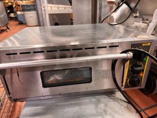 Sodir PZ430S countertop pizza oven, 120V, stainless steel, with temperature controls. Used condition, minor surface wear.