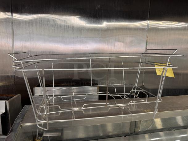 Stainless steel chafing dish stand for full-size tray, model BIDX5, in good condition.
