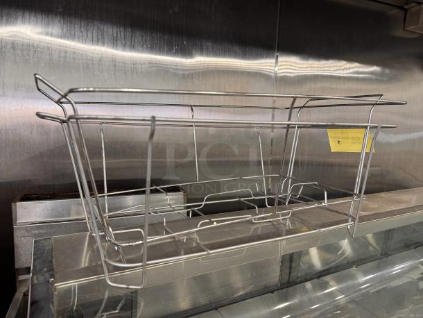 Metal chafing dish stand for full-size tray, model BIDX5, in good condition. Visible yellow tag marked "86" indicates item number.