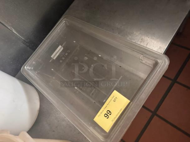 Clear plastic food storage container with lid, item number 99, in good condition; marked "Fry Max Greenville."