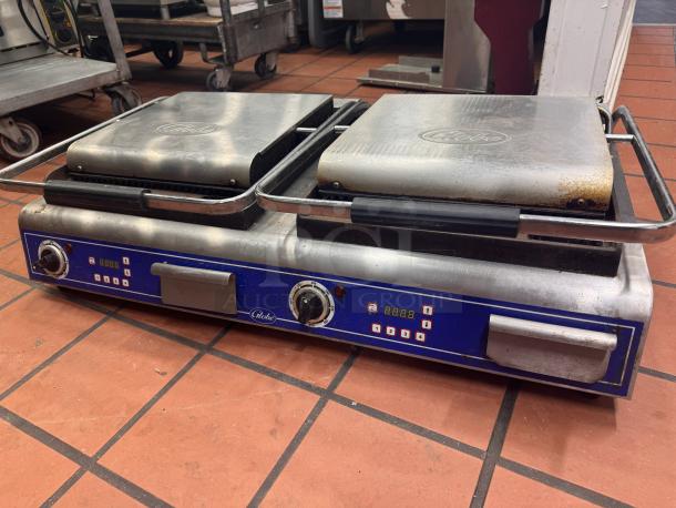 Globe GPGDUE14D Double Panini Grill, stainless steel, two cooking plates, digital controls, used condition.