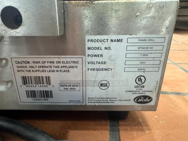 Globe GPGDUE14D Double Panini grill, 240V, 7.2KW, made Mar 2023. NSF and UL listed, with caution label for safe operation.