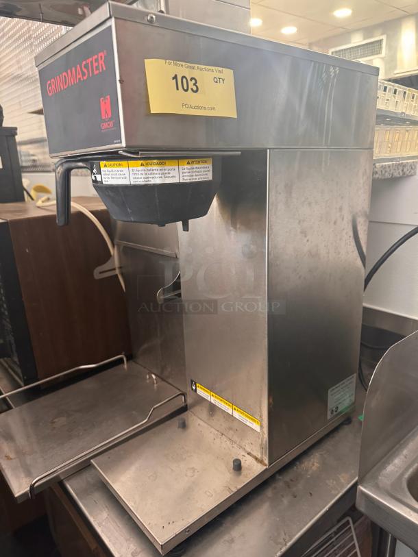 Grindmaster GMCW CPO-SAPP coffee brewer 120V, stainless steel, commercial use, visible wear, auction tag "103."