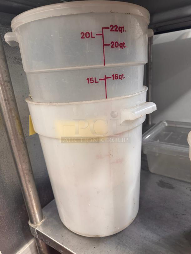 Lot of 2 round, 22-quart food storage containers. Marked with volume measurements. Used condition.