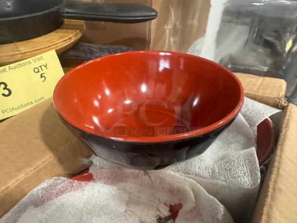 Brand new BIDX12 bowl, red interior, black exterior, pristine condition, displayed in packaging.