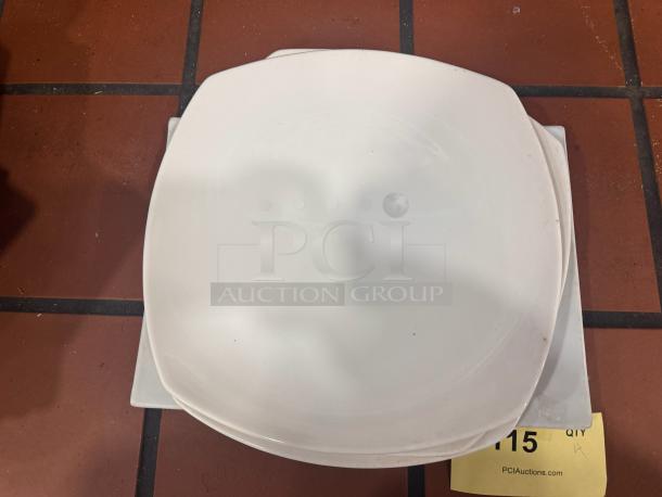 Porcelain dinner plate BIDX4, white, square shape, minimal wear, ideal for collectors or everyday use. Auction tag present.