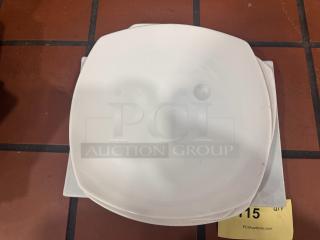 Porcelain dinner plate BIDX4, white, square shape, minimal wear, ideal for collectors or everyday use. Auction tag present.