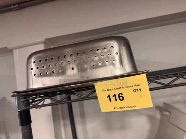 Perforated stainless steel food pan, used condition, features ventilation holes, auction tag with lot number 116.