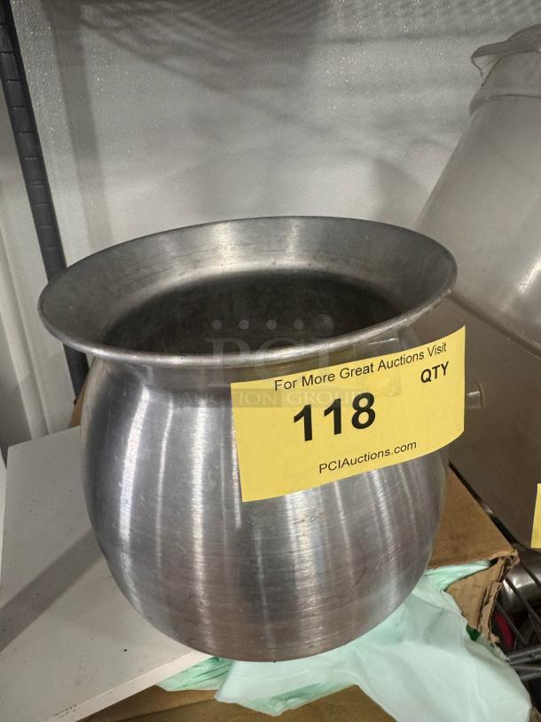 Aluminum sticky rice pot with a wide rim, showing signs of wear. Auction tag reads "118."