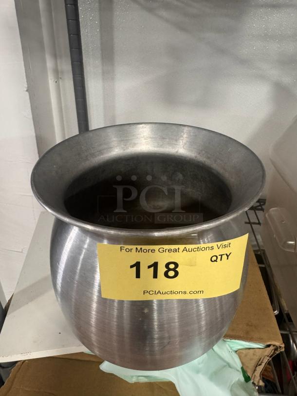 Aluminum sticky rice pot with wide rim and cylindrical shape, in good condition. Auction label reads "118, PCIauctions.com."