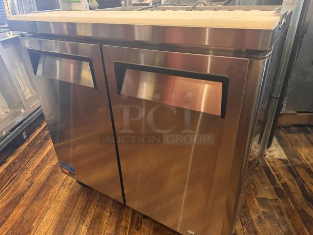 Turbo Air MST-36 prep table, 115V, stainless steel, two-door, used condition, visible brand label on bottom left.