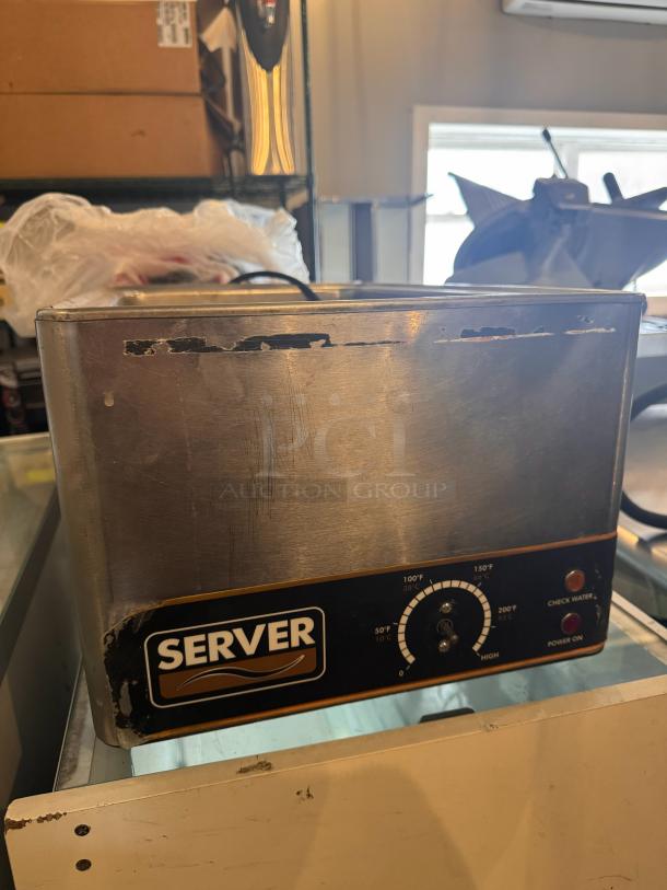 Server FS-20SS Countertop Food Warmer with temperature dial, visible wear, and logo. Ideal for commercial use.